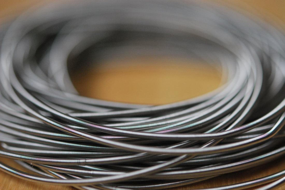 close up of stainless steel spring bracelets