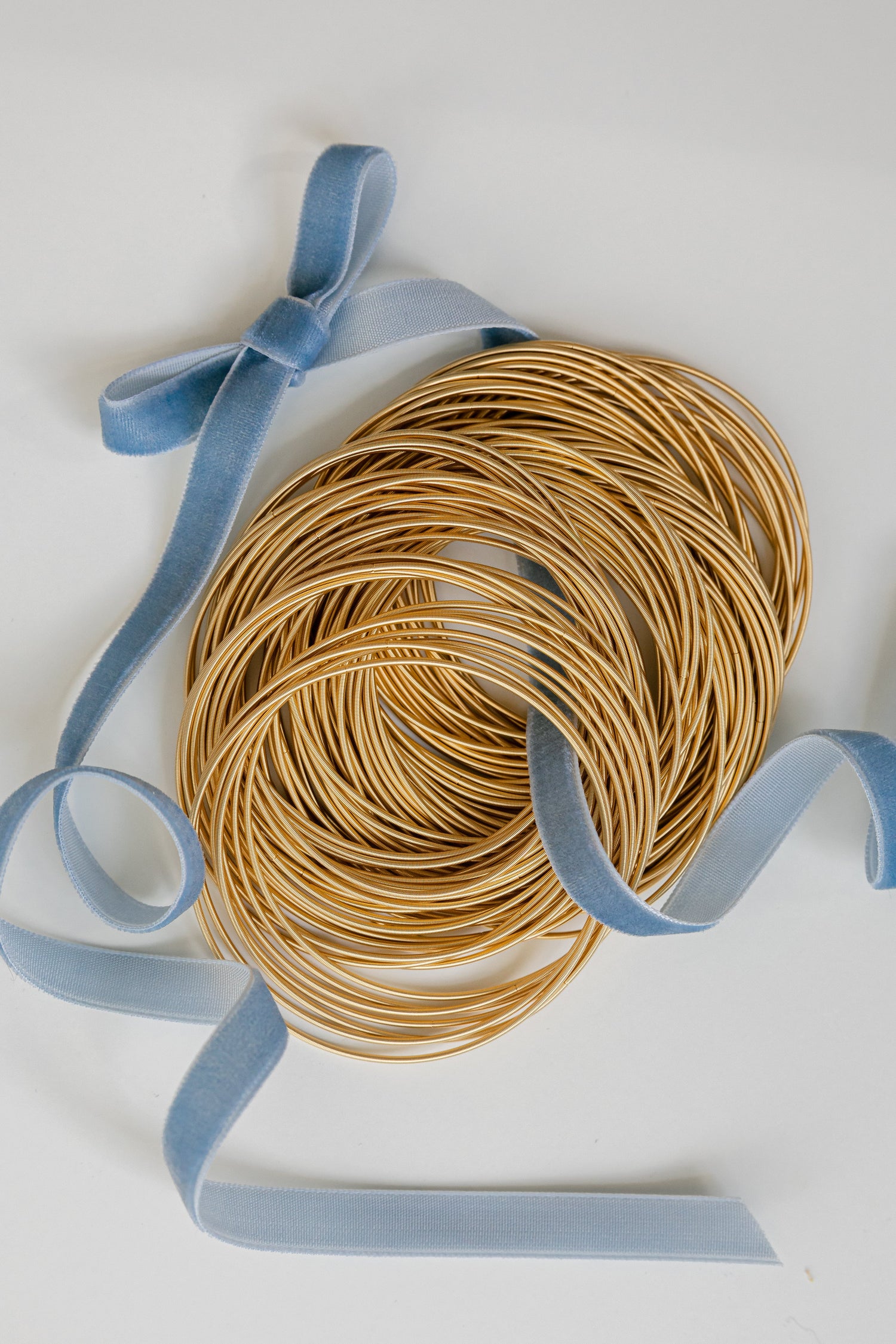 Model wearing Gold DIA Bracelets