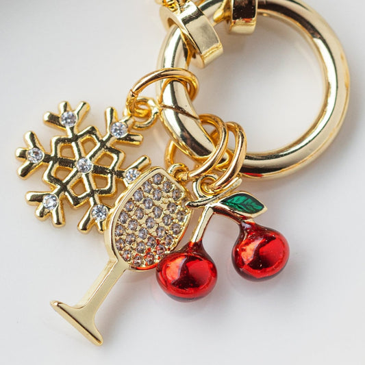 Gold Snowflake Charm on charm chain necklace with Wine Glass Charm and Cherries