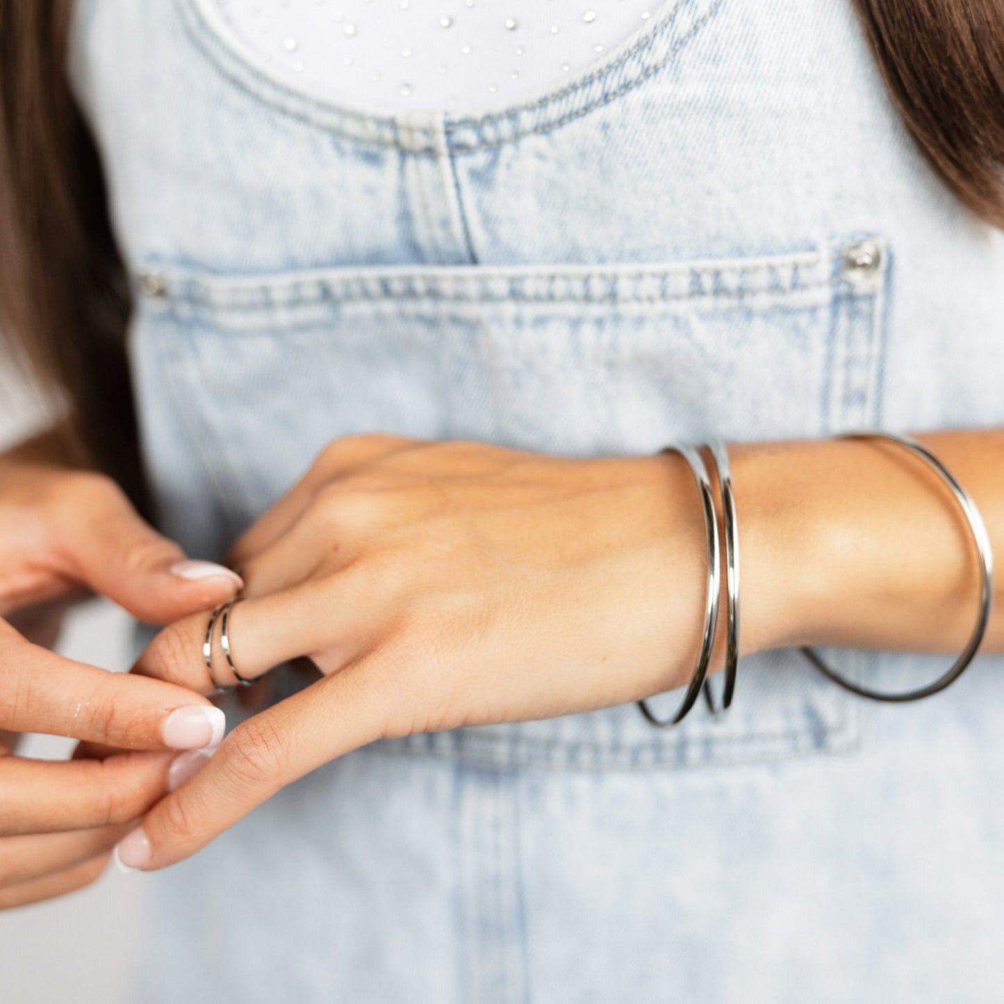 Stainless Steel Silver Luxe Bangles worn by model