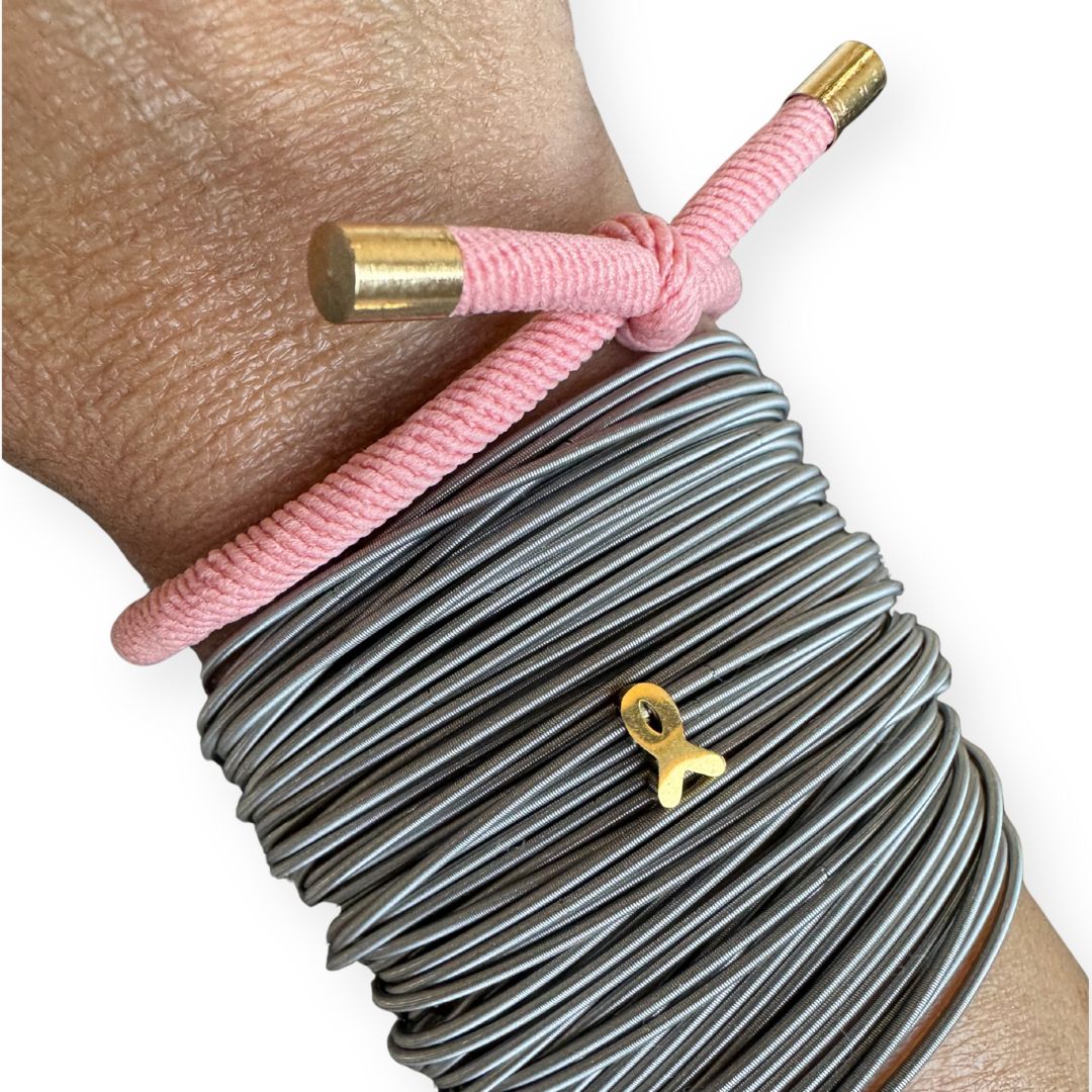 stainless steel dia pink hair tie and gold ribbon charm