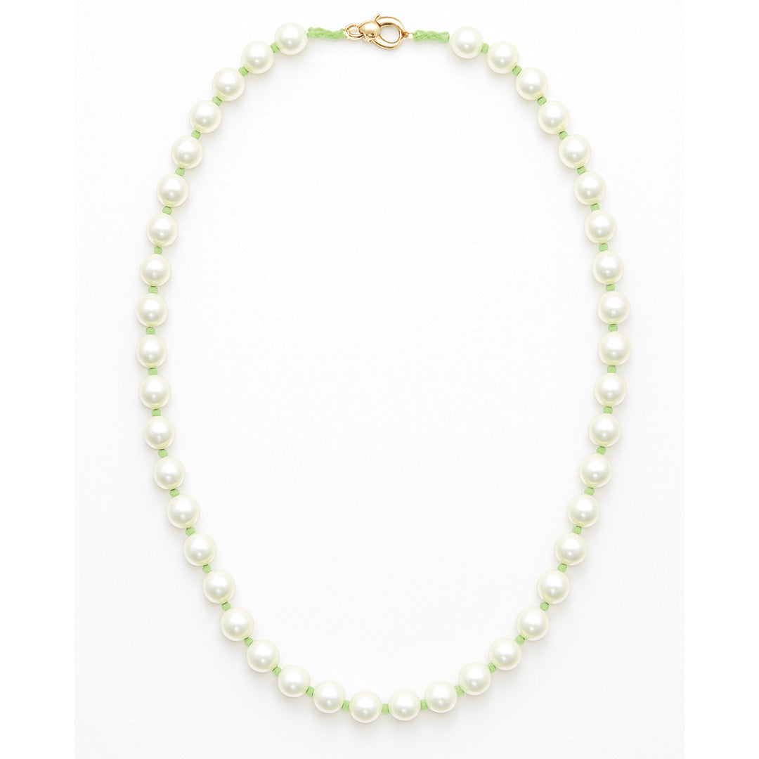 Pearl necklace with a gold clasp on a white background