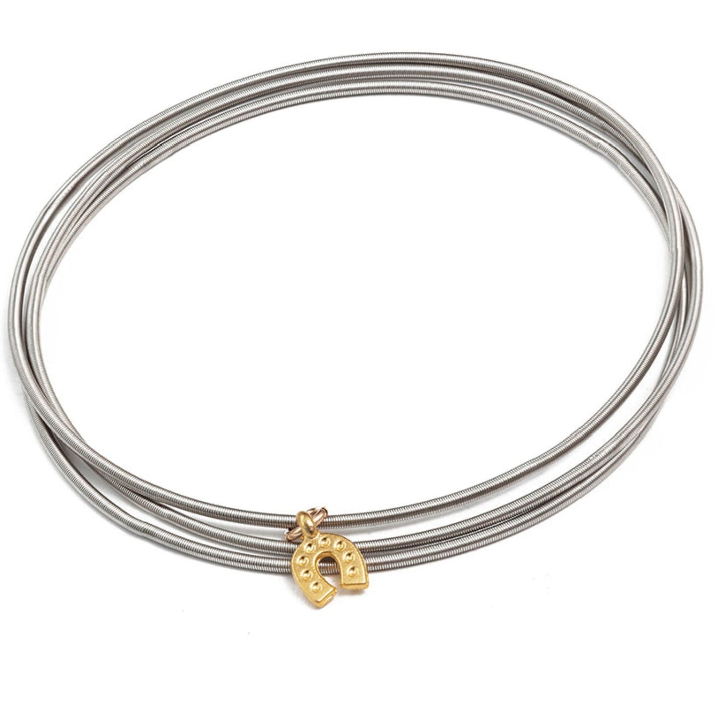 Gold horseshoe charm on stainless steel bracelets