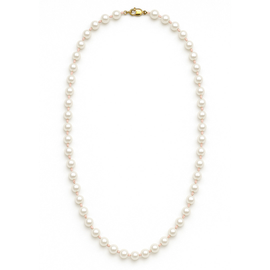 Pearl necklace with a gold clasp on a white background