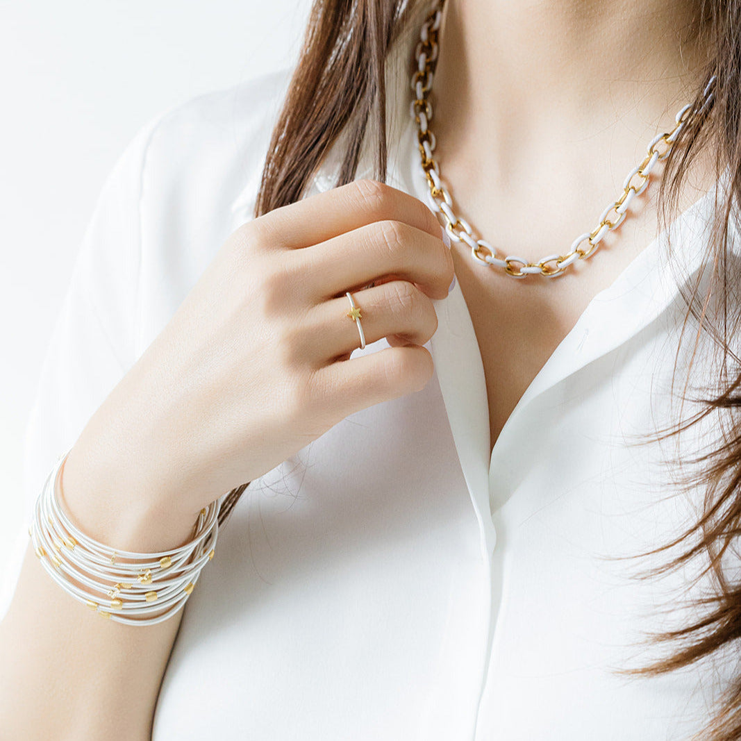 model wearing blush enamel chain necklace with sterling beaded DIA