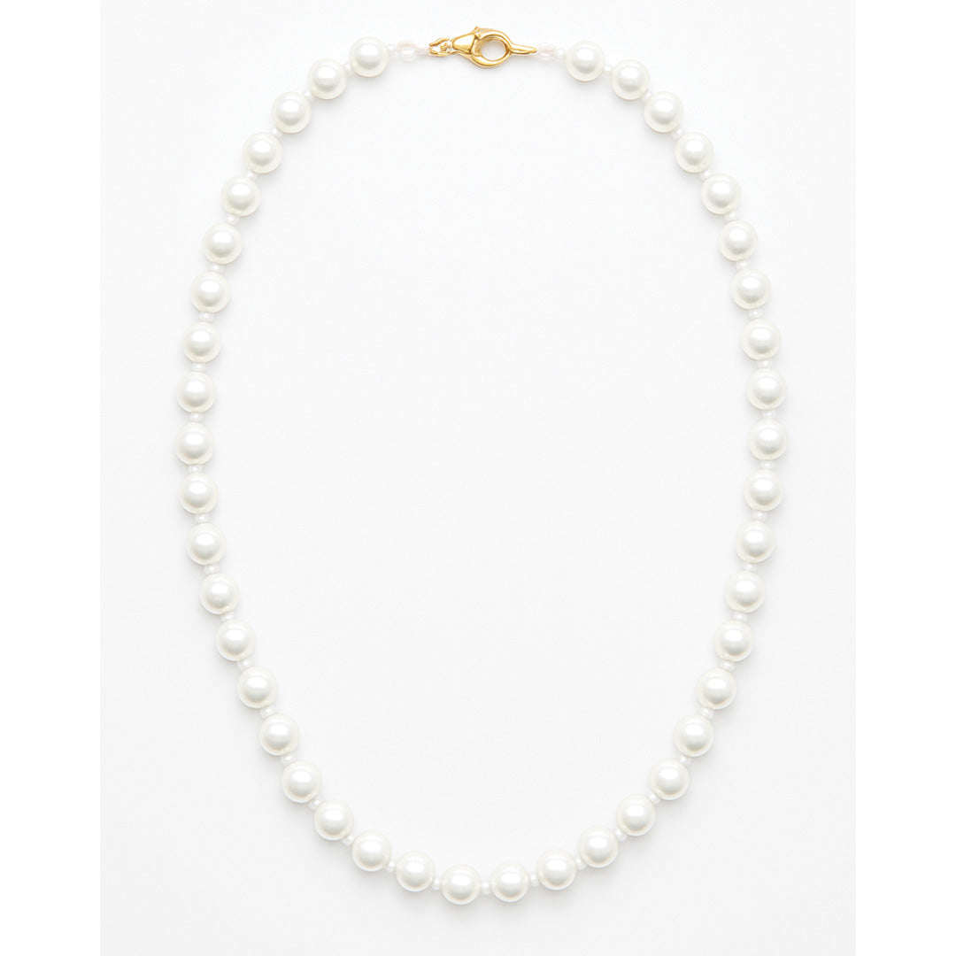 Pearl necklace with a gold clasp on a white background