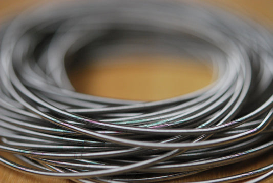 close up of stainless steel spring bracelets