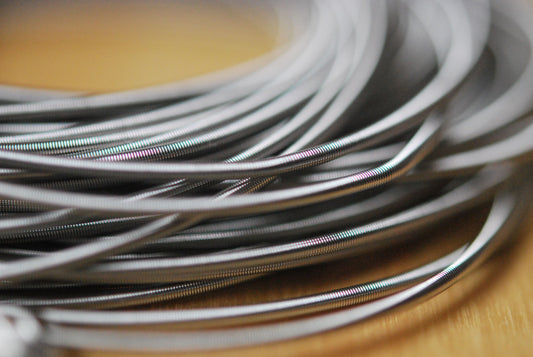 close up of stainless steel spring bracelets
