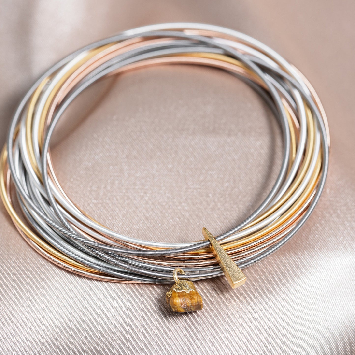 Balance Bundled DIA Set with 10 mixed metal warm Dia and one Gold Traingle Charm and one Tiger Eye Crystal Charm