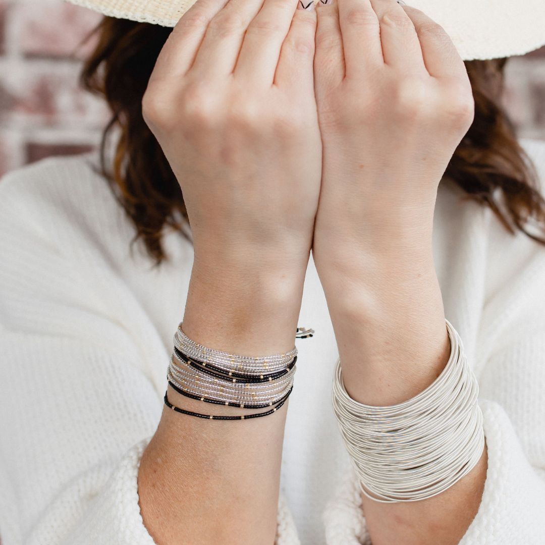Cool Neutral Beaded Friendship Bracelets on Model wearing Sterling DIA