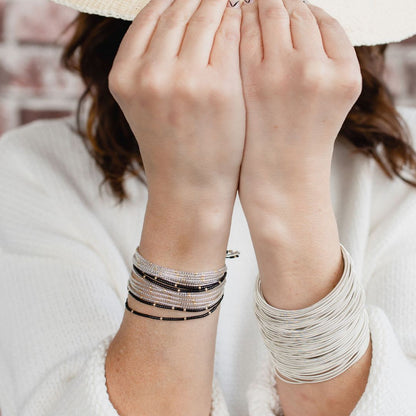 Cool Neutral Beaded Friendship Bracelets on Model wearing Sterling DIA