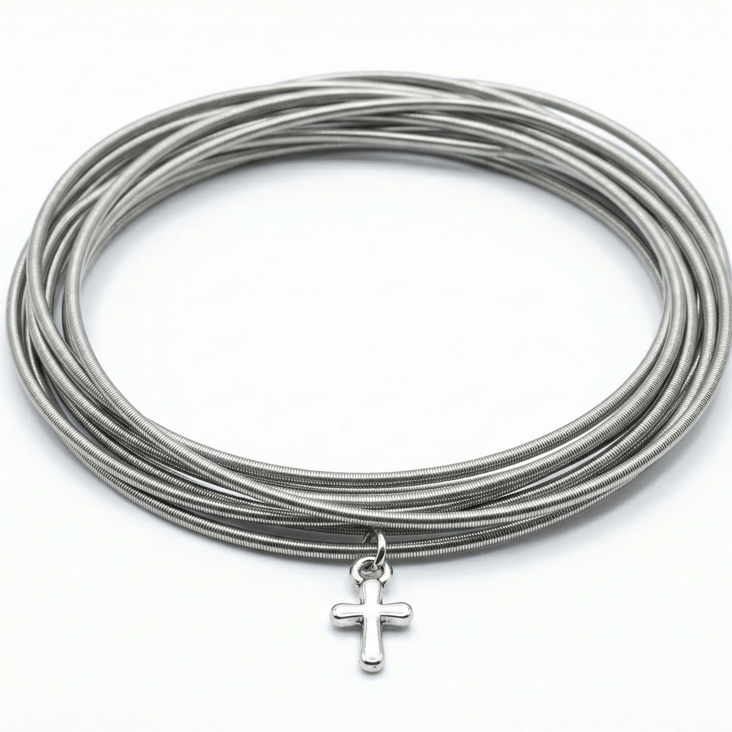 Stainless DIA with a cross pendant on a white background