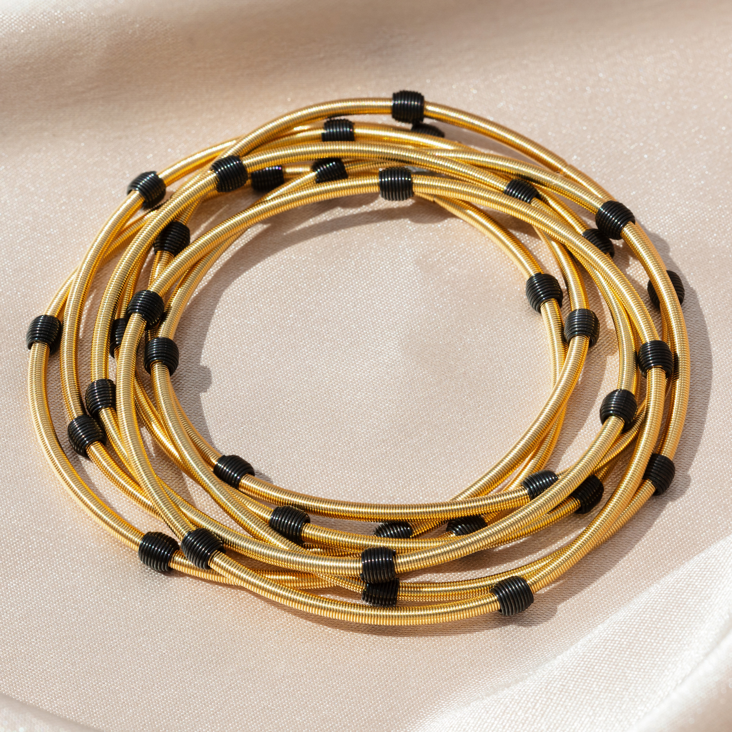 Gold Beaded Dia with Black Beads