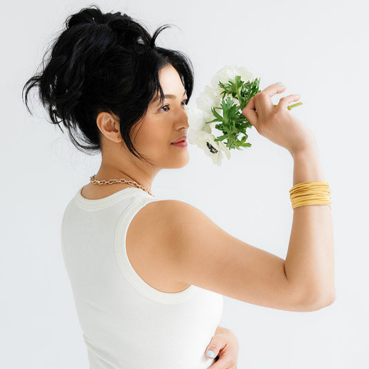 Model wearing Gold DIA