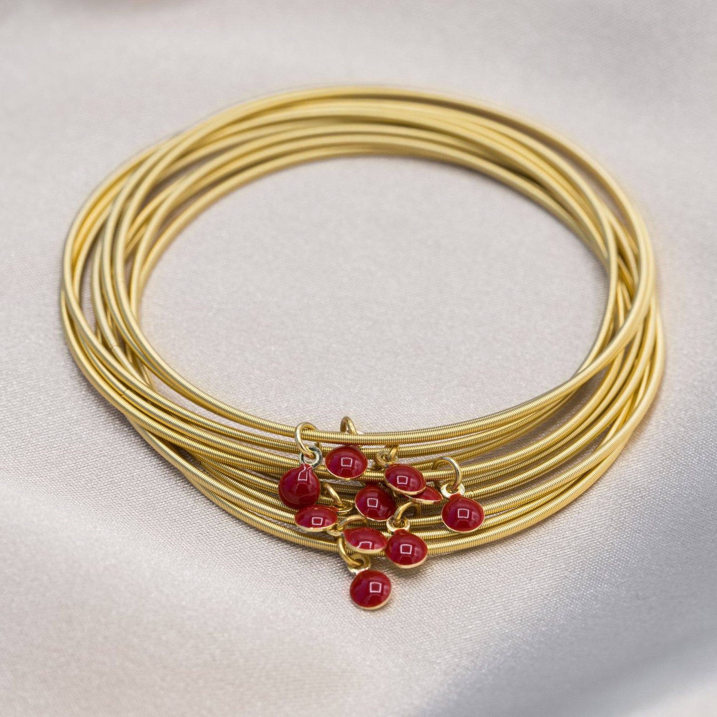 Gold DIA with Red enamel disc charms