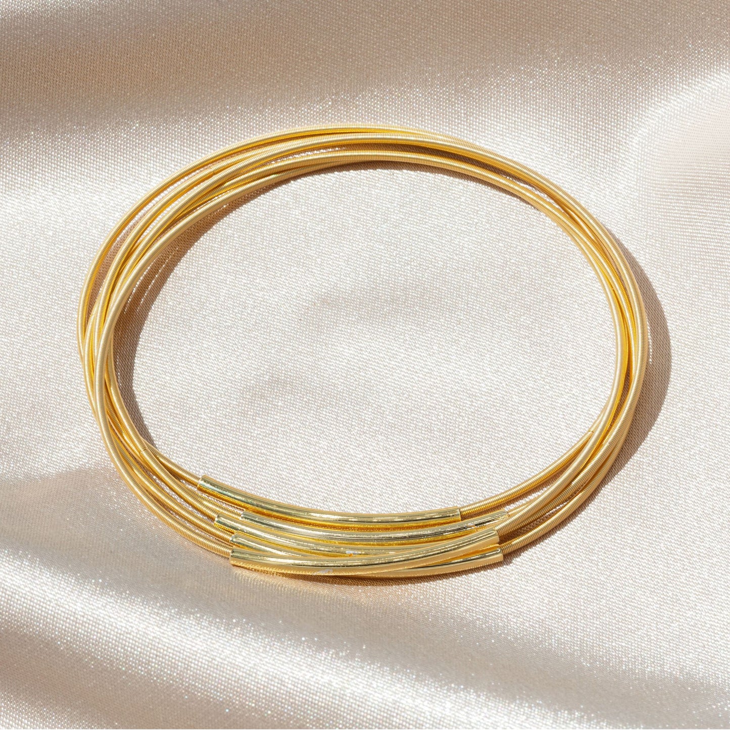 Gold Dia Bracelets with Gold Charm Tube