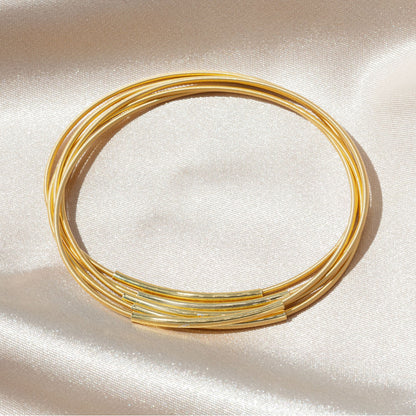 Gold Dia Bracelets with Gold Charm Tube