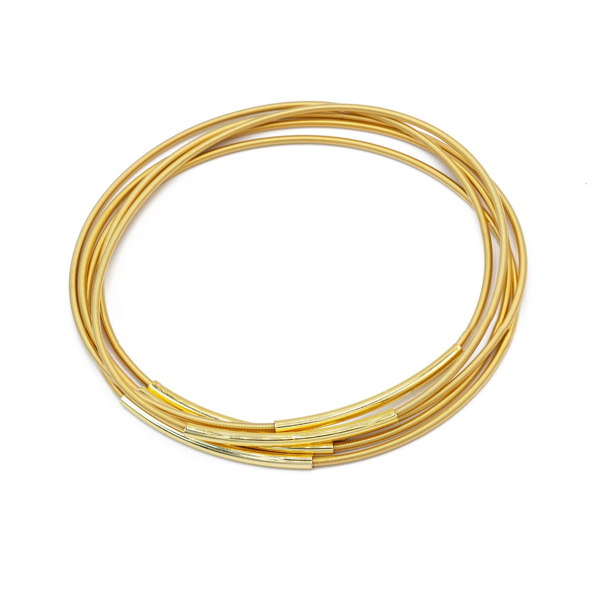 Gold Tube Charm On Gold Dia Bracelet