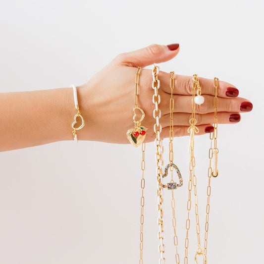 White Paracord Bracelet who's with multiple chain charm necklaces