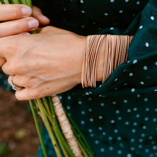 Set of  25 Rose Gold Bracelets on model