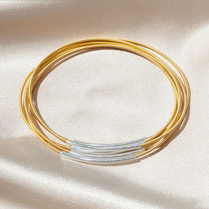 Silver Tubes on Gold Dia Bracelets
