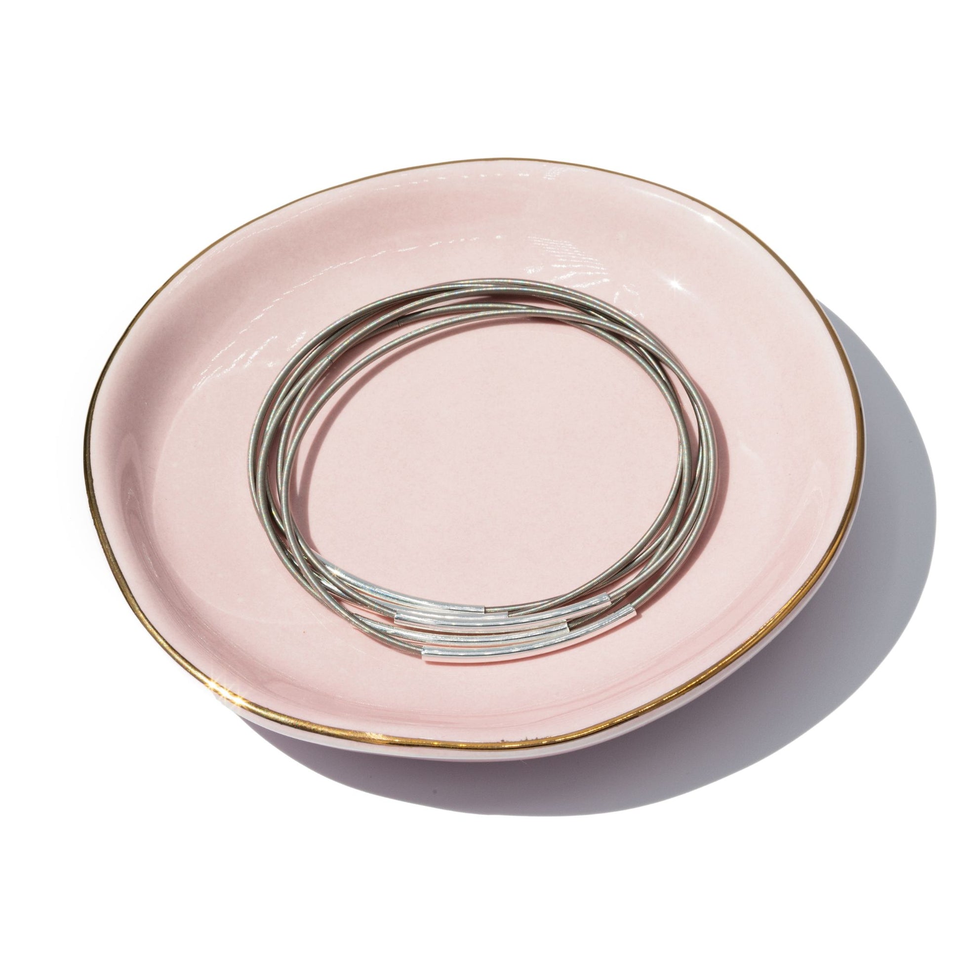 Stainless Dia with Silver Tube Charms in jewelry dish