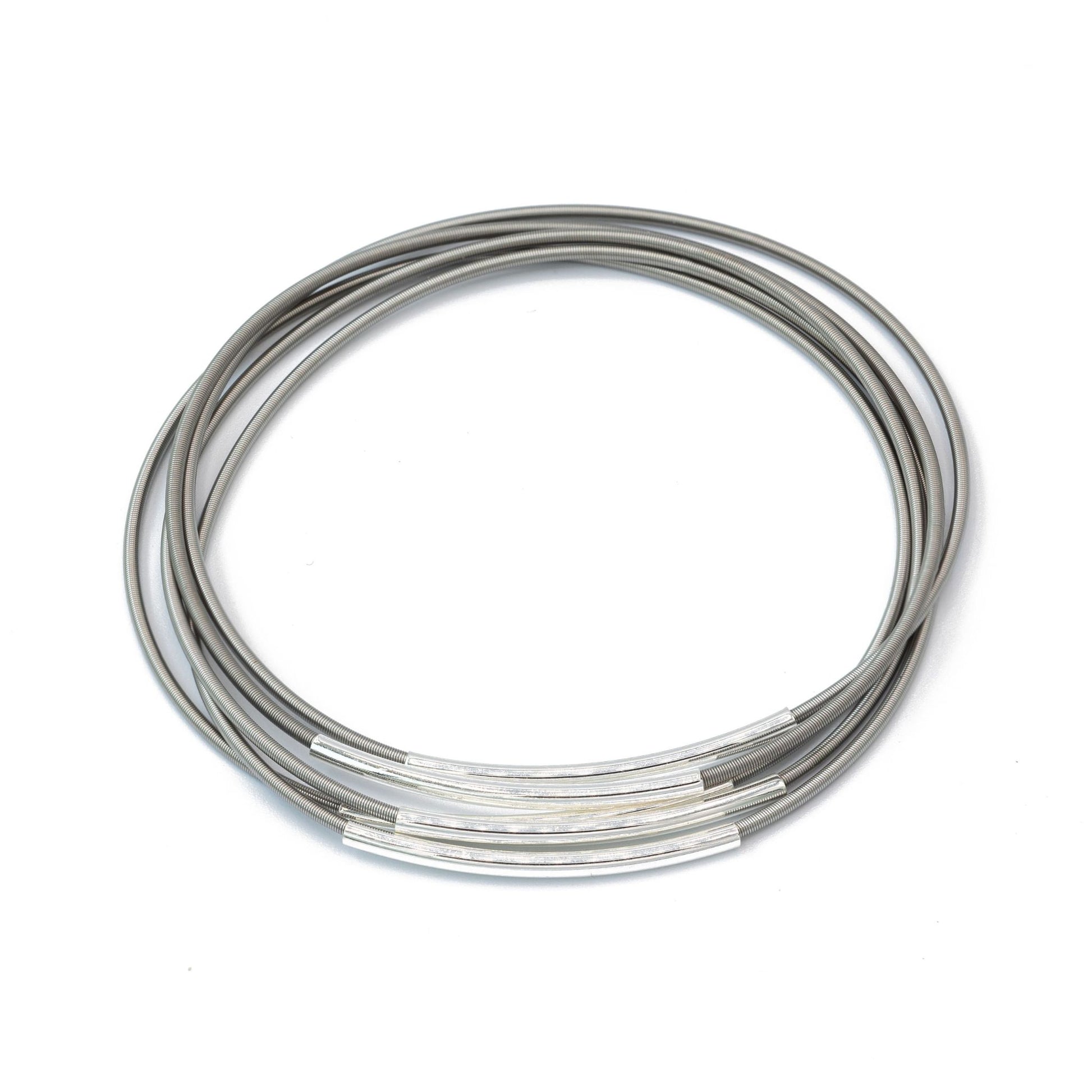 Stainless Steel Dia Bracelet with Silver Tube Charm