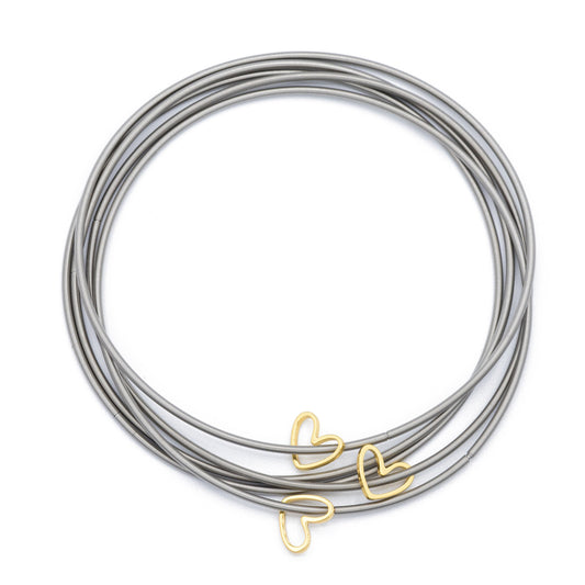 Three Gold Cut Out Heart Charms on Five Stainless Steel DIA