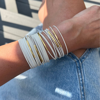 Sterling Bracelets with Gold Tubes on model