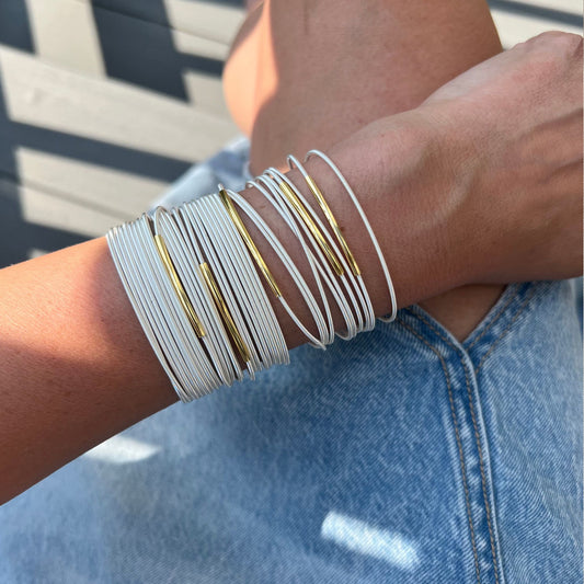 Sterling Bracelets with Gold Tubes on model