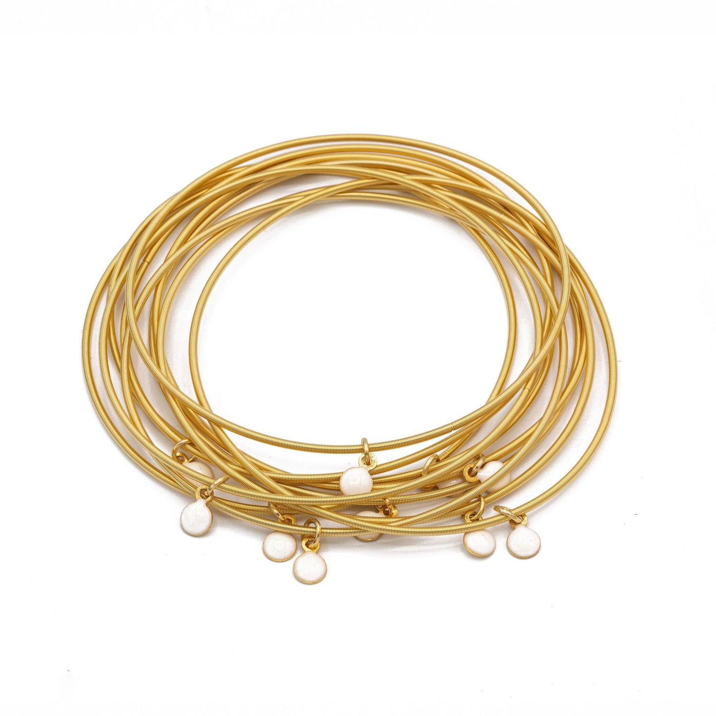 White enamel disc charms on Gold Dia