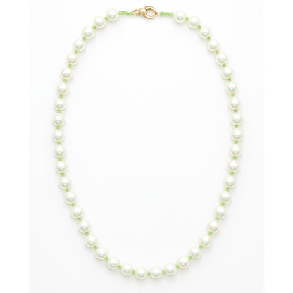 Pearl necklace with a gold clasp on a white background