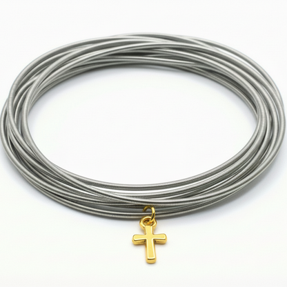 stainless DIA with a gold cross pendant on a white background