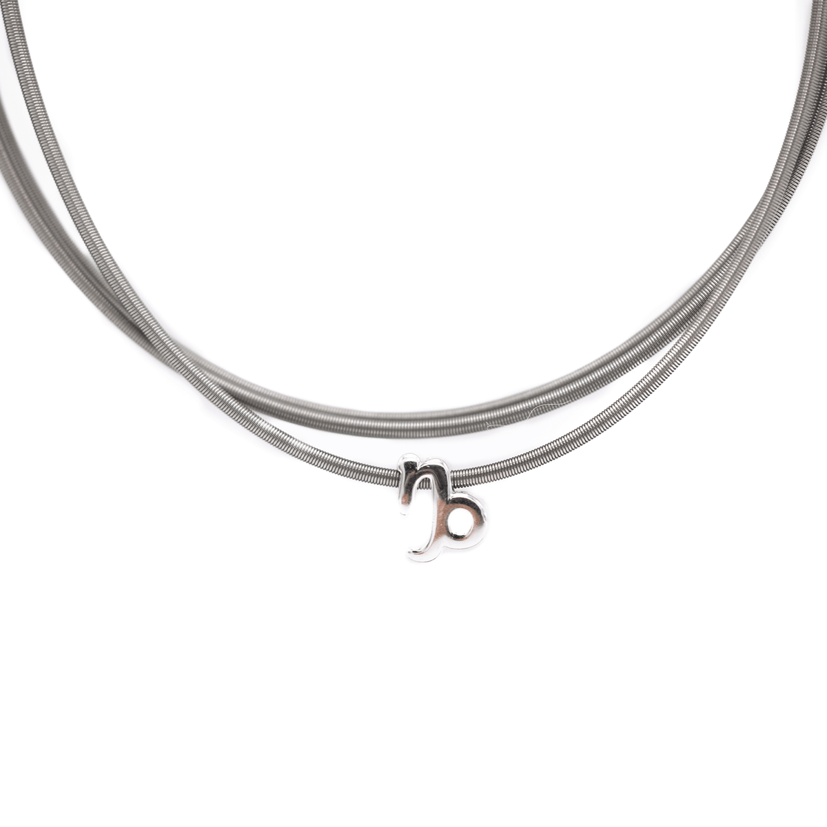 Libra zodiac charm on a silver DIA spring bracelet set