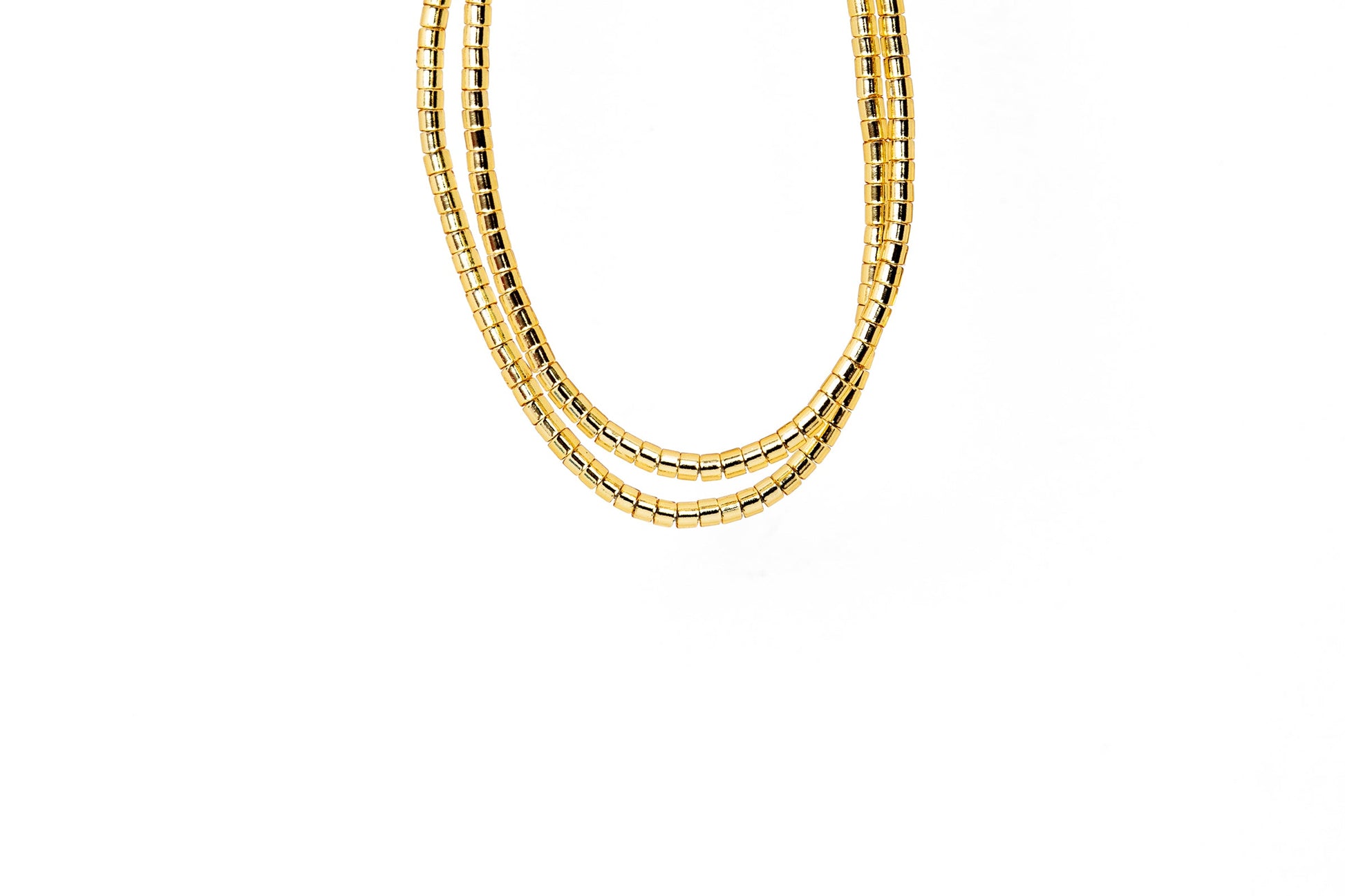 2 tiny beaded bracelets on string. Tiny gold beads.