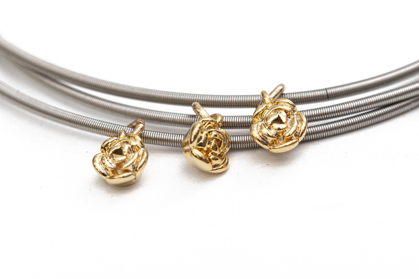 3 tiny gold rose charms